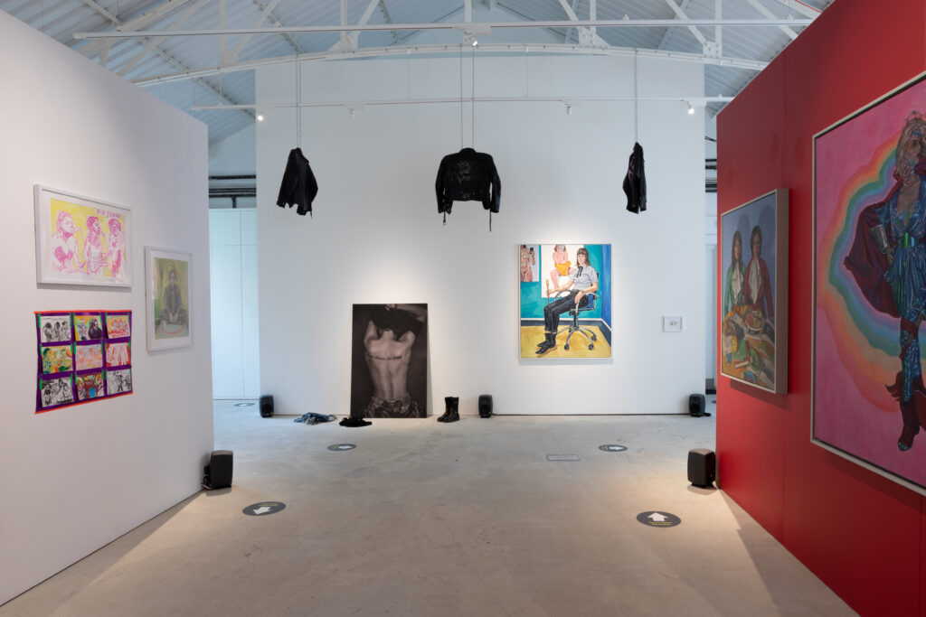 Rebel Dykes - Wide shot ft. (left to right) - Bella Podpadec, Kat Hudson, Jojo B, Fisch, Kasra Jalilipour, Rene Matić, Sarah Jane Moon, Nina Wakeford, Roxana Halls